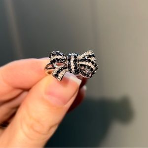 1/2 CT. T.W. Enhanced Black and White Diamond Bow Ring in 10K White Gold. Size 7